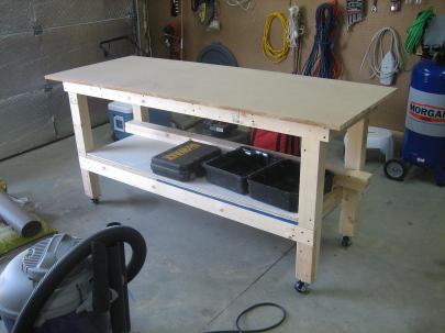 Then I cut some Medium Density Fiberboard (MDF) for the benchtop, overhanging each side by about 3". I've been told to do this so I can clamp airplane parts to the bench more easily. Figuring I'd be replacing the top a few times during the project, I secured it down with some countersunk screws. Hopefully I'll get the vise bolted down in the next few days.