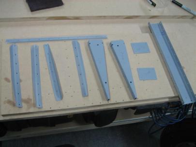 Stiffeners, doublers, trailing edge wedge, spar, and ribs ready to rivet.